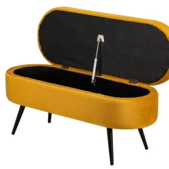 Bank van metaal en geel mosterdfluweel