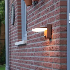 Qazqa buitenlampen met sensor esmee bronskleurig geïntegreerde led