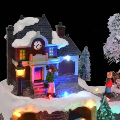 vidaXL - Miniatuur kerstdorp met treinstation - 23,5x16x18,5 cm - Hars